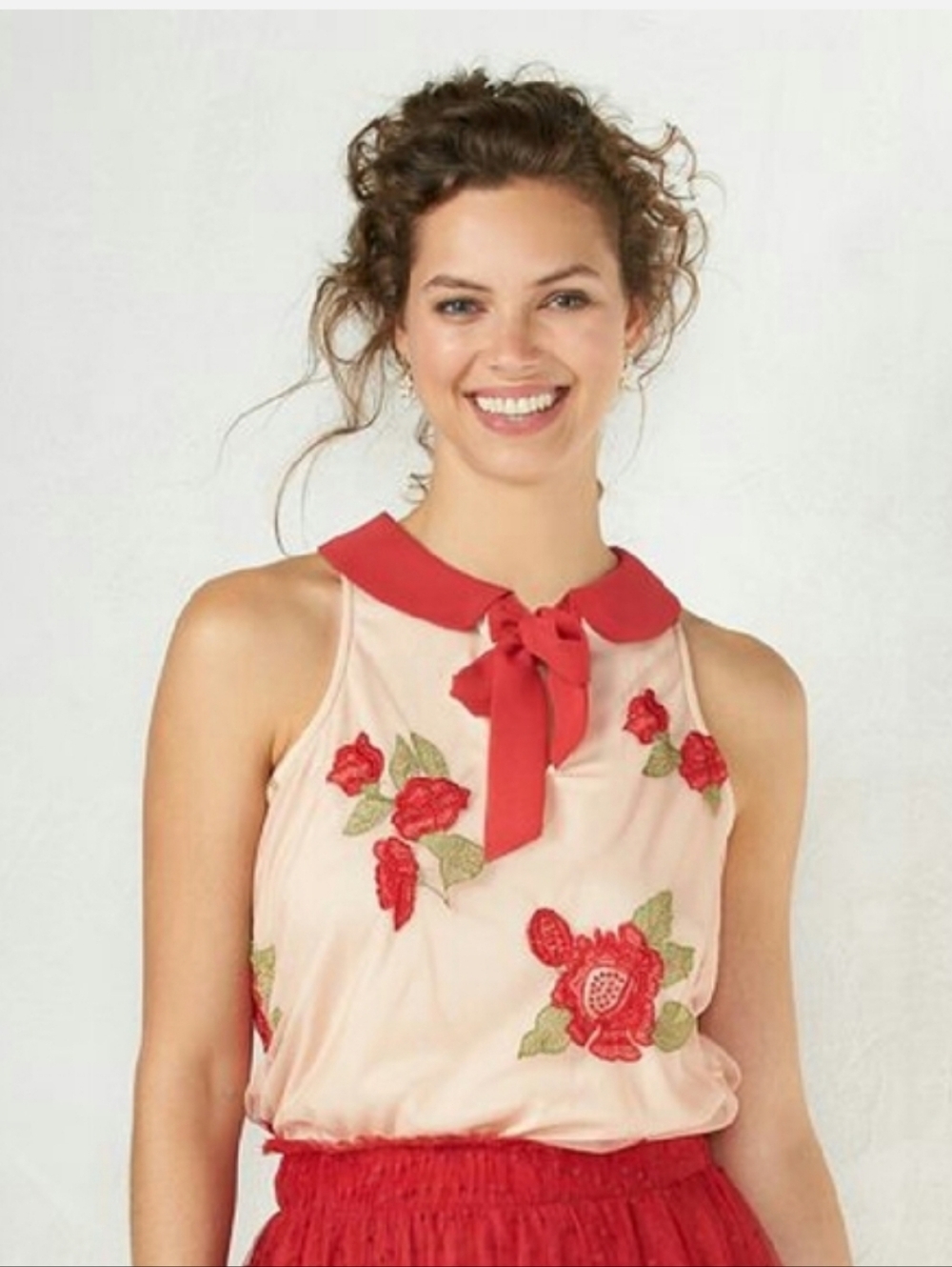Disney x LC Lauren Conrad sleeveless mesh top in a beige or peach color with red